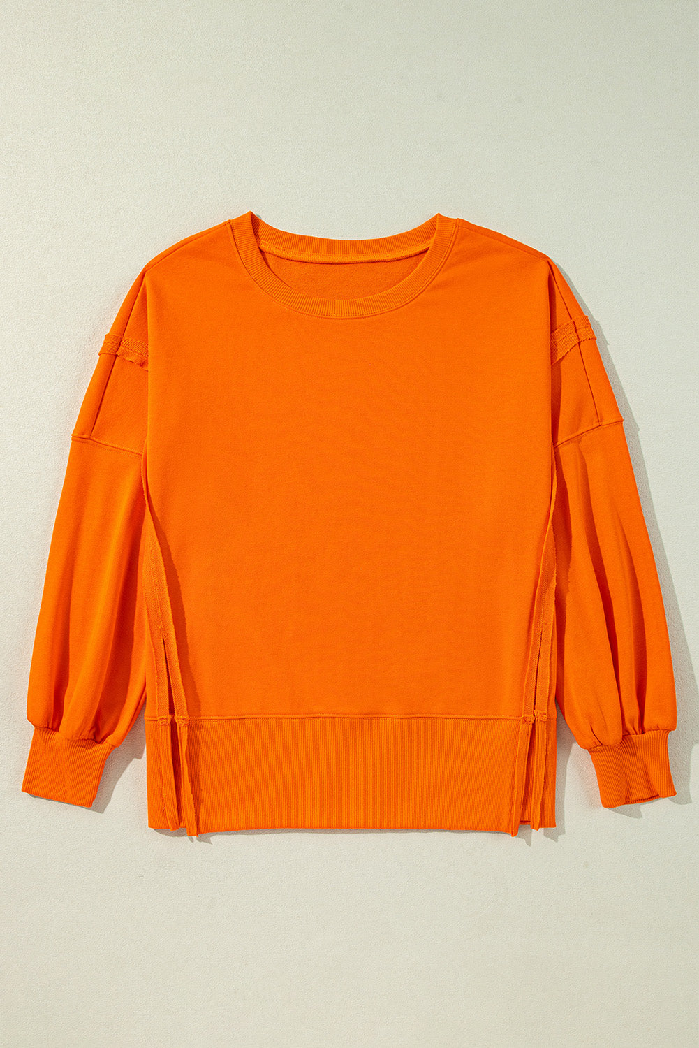 Carrot Exposed Seam Drop Shoulder Side Slit Sweatshirt-True and Wild