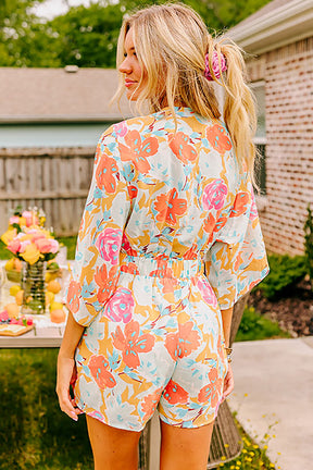 Orange Floral Print Front Tie V Neck Romper