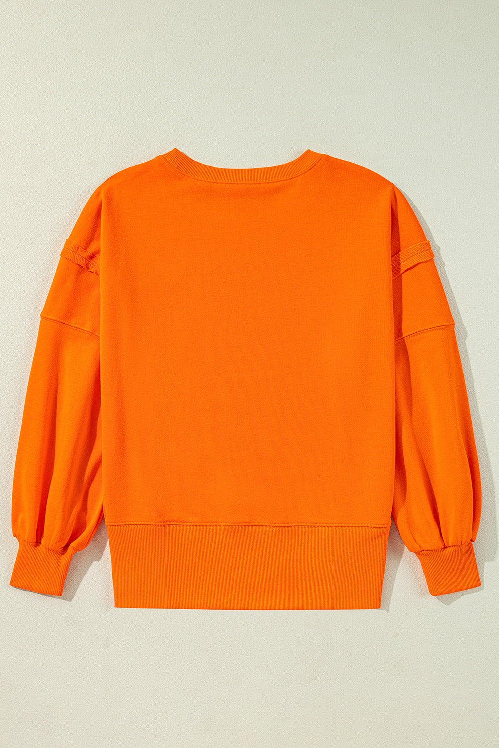 Carrot Exposed Seam Drop Shoulder Side Slit Sweatshirt-True and Wild