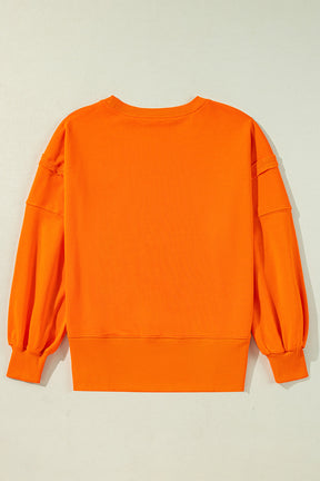 Carrot Exposed Seam Drop Shoulder Side Slit Sweatshirt-True and Wild