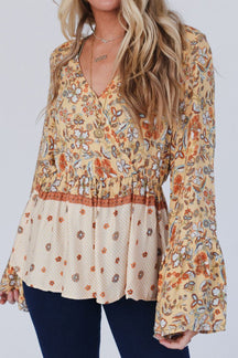 Peplum Printed Surplice Flare Sleeve Blouse