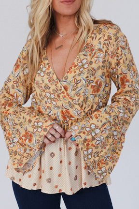 Peplum Printed Surplice Flare Sleeve Blouse